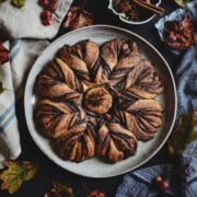 Sourdough chai spice star bread on a serving platter on a table